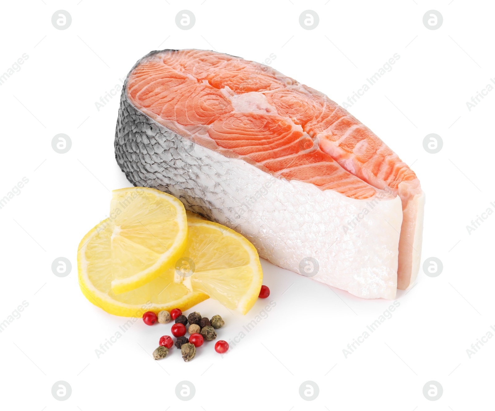 Photo of Steak of fresh raw salmon and spices isolated on white