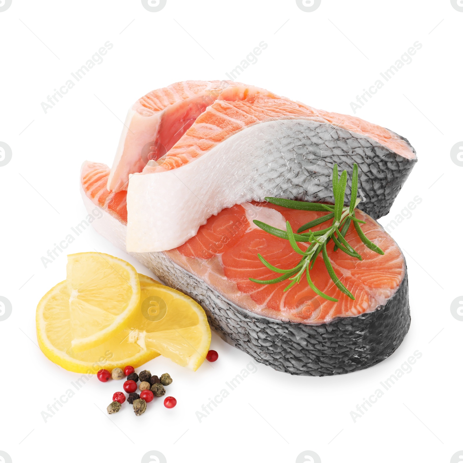 Photo of Steaks of fresh raw salmon and spices isolated on white