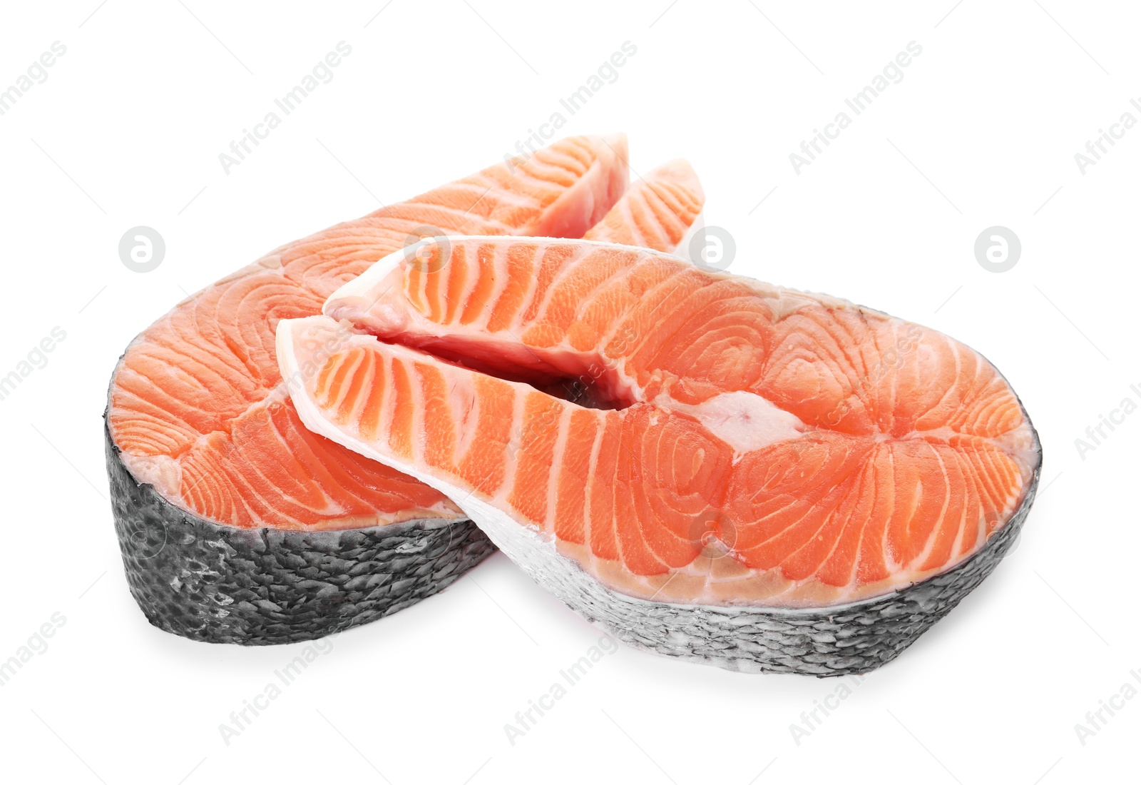 Photo of Steaks of fresh raw salmon isolated on white