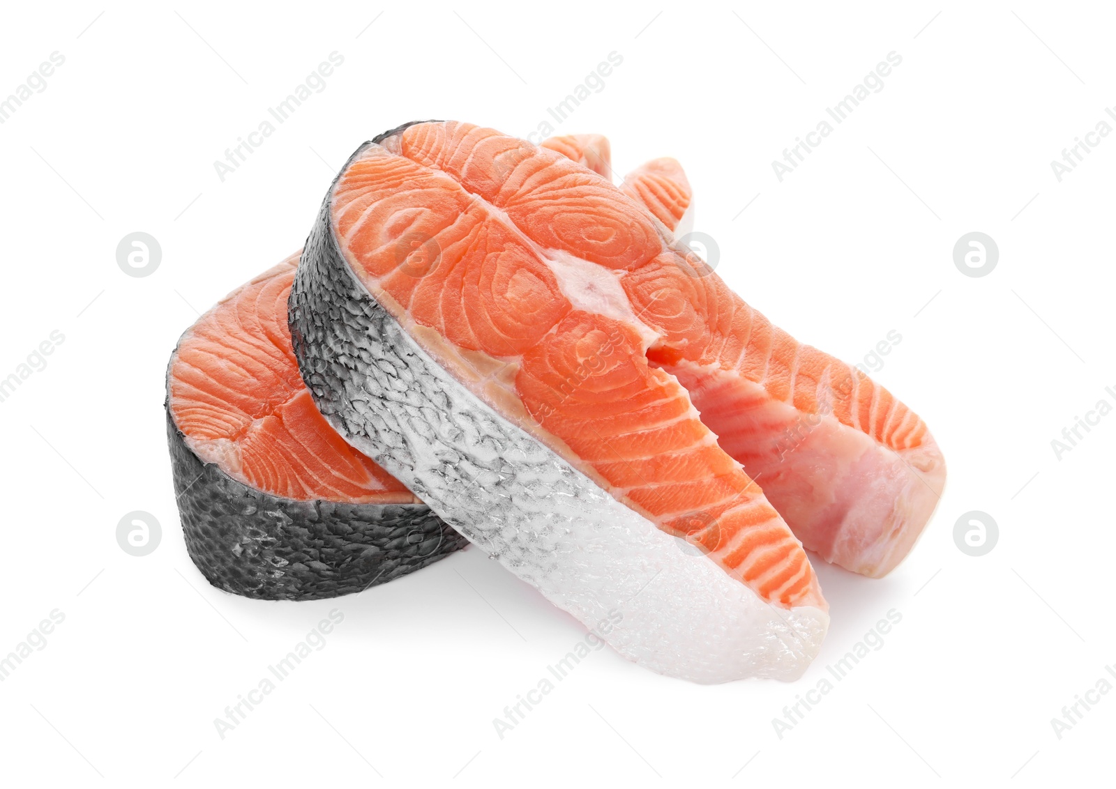 Photo of Steaks of fresh raw salmon isolated on white