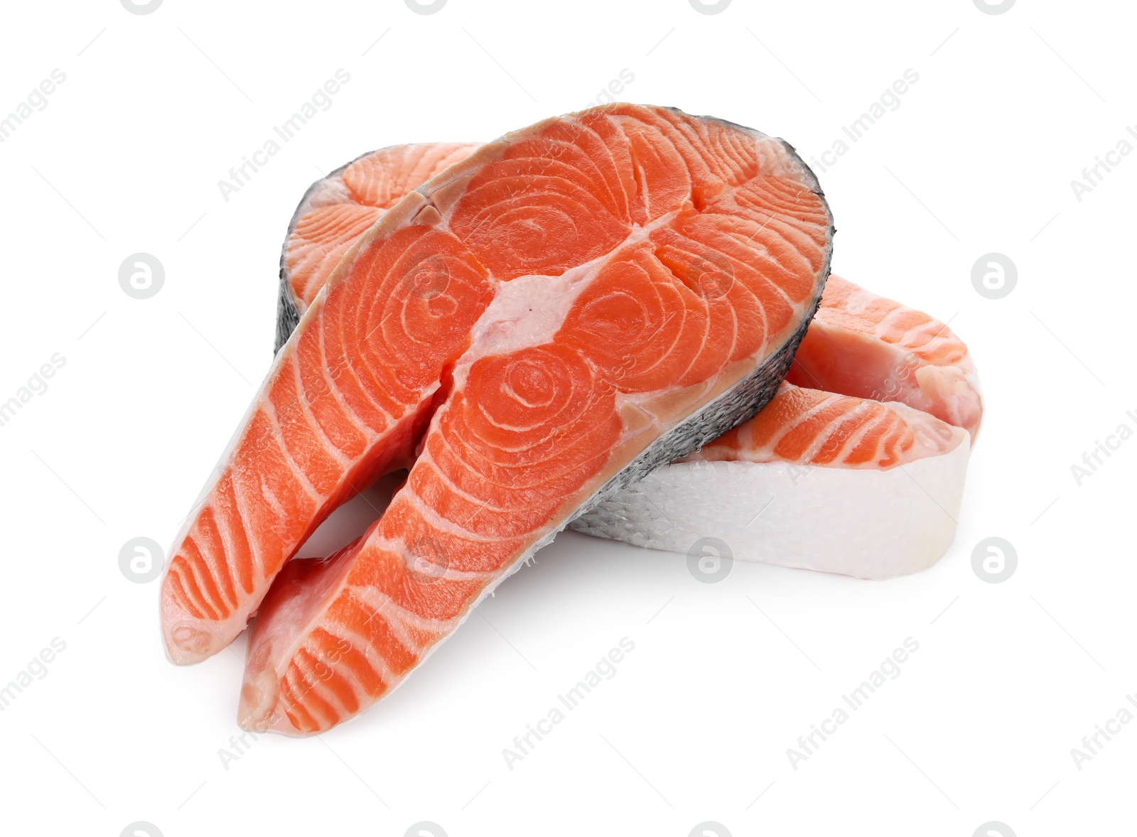 Photo of Steaks of fresh raw salmon isolated on white