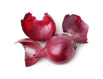 Photo of Fresh onion with peels isolated on white, top view