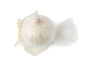 Photo of Fresh onion with peels isolated on white, above view