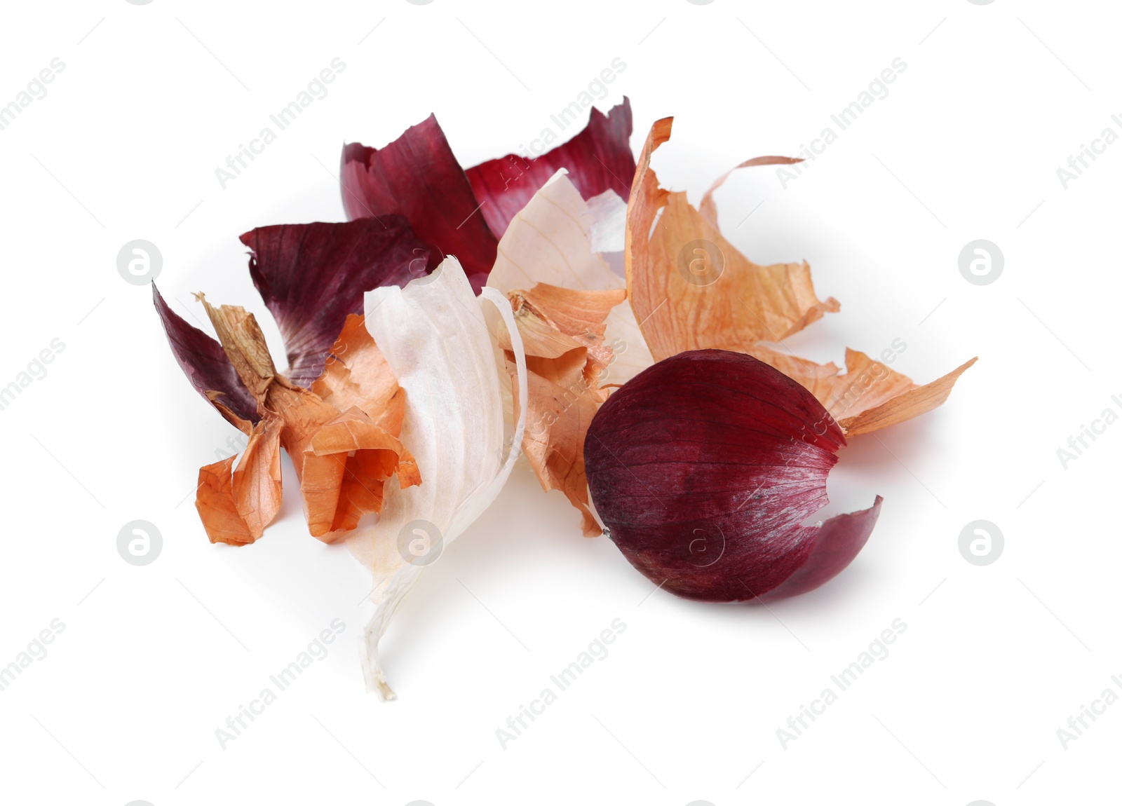 Photo of Pile of different onion peels isolated on white