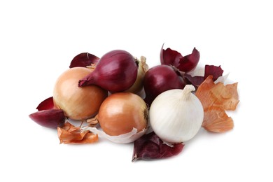 Photo of Fresh onions with peels isolated on white