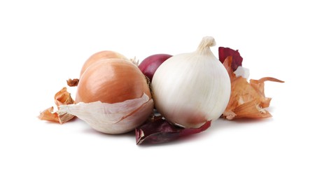 Photo of Fresh onions with peels isolated on white