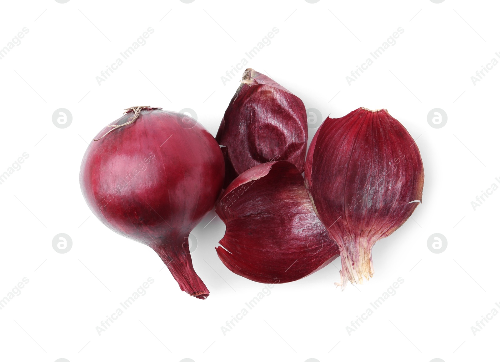 Photo of Fresh onion with peels isolated on white, top view