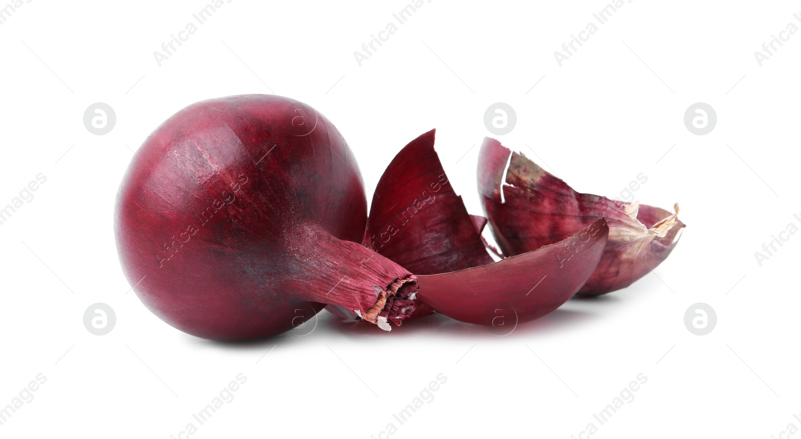 Photo of Fresh onion with peels isolated on white