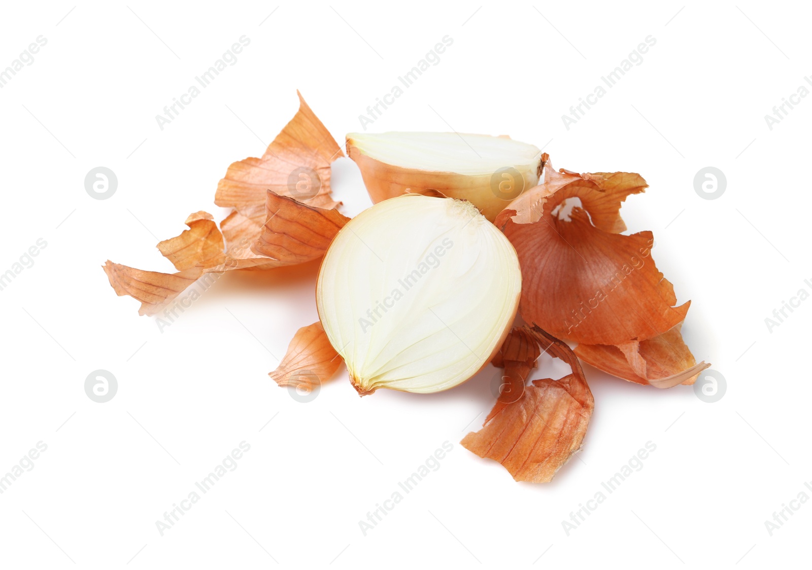 Photo of Halves of fresh onion with peels isolated on white