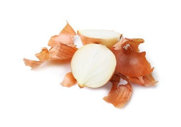 Photo of Halves of fresh onion with peels isolated on white