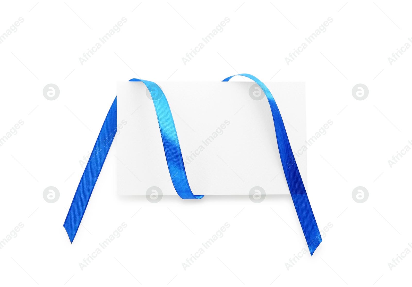 Photo of Blank card and blue ribbon isolated on white, top view