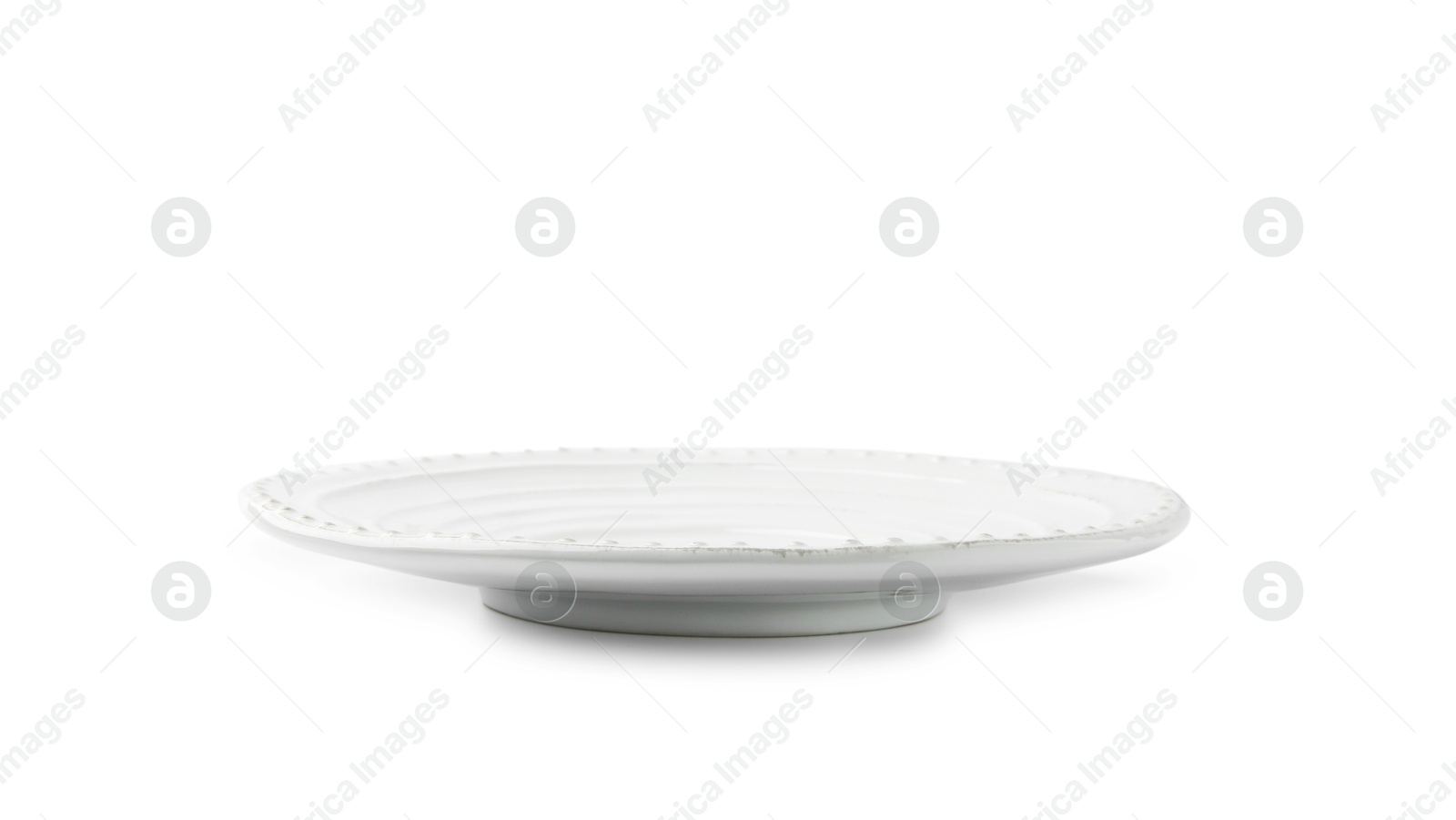 Photo of One empty ceramic plate isolated on white