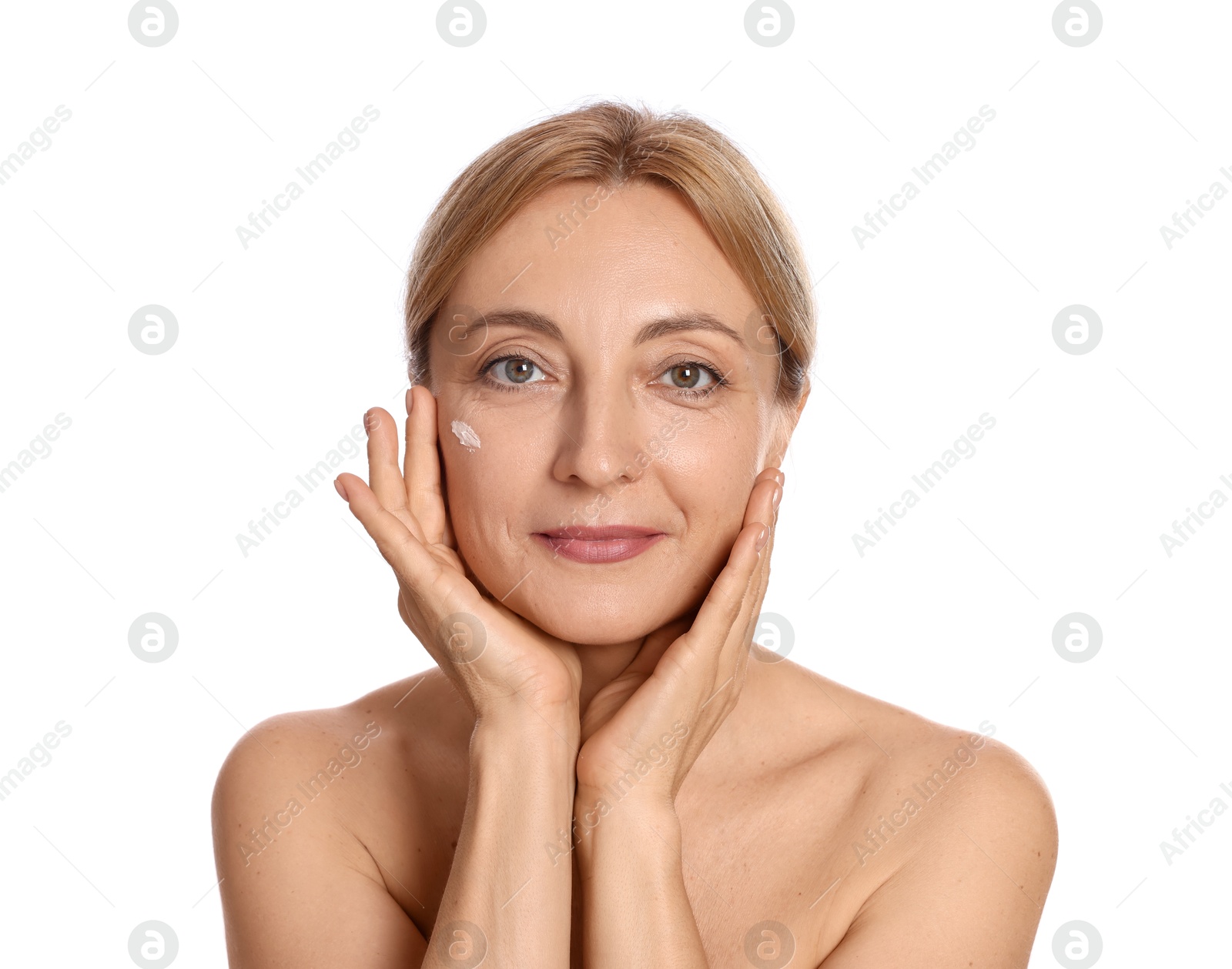 Photo of Beautiful woman with cream on face against white background