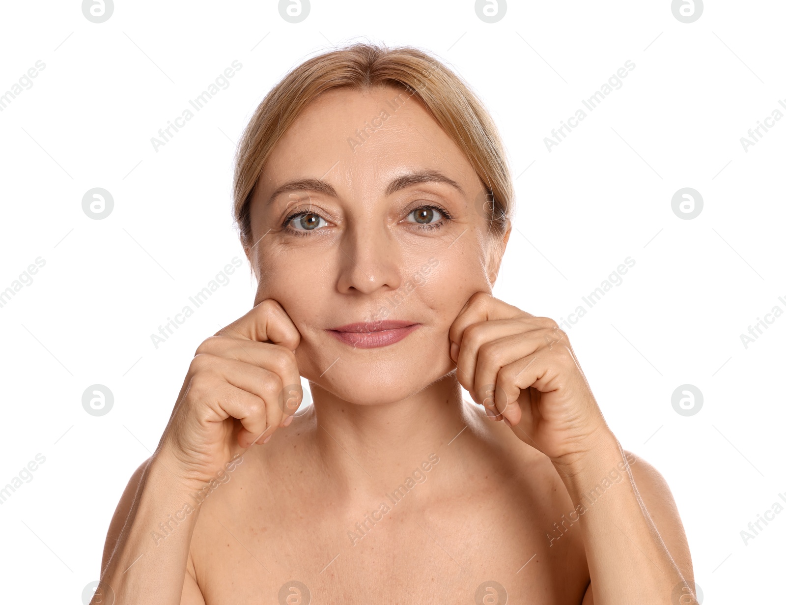 Photo of Beautiful woman doing facial self massage on white background