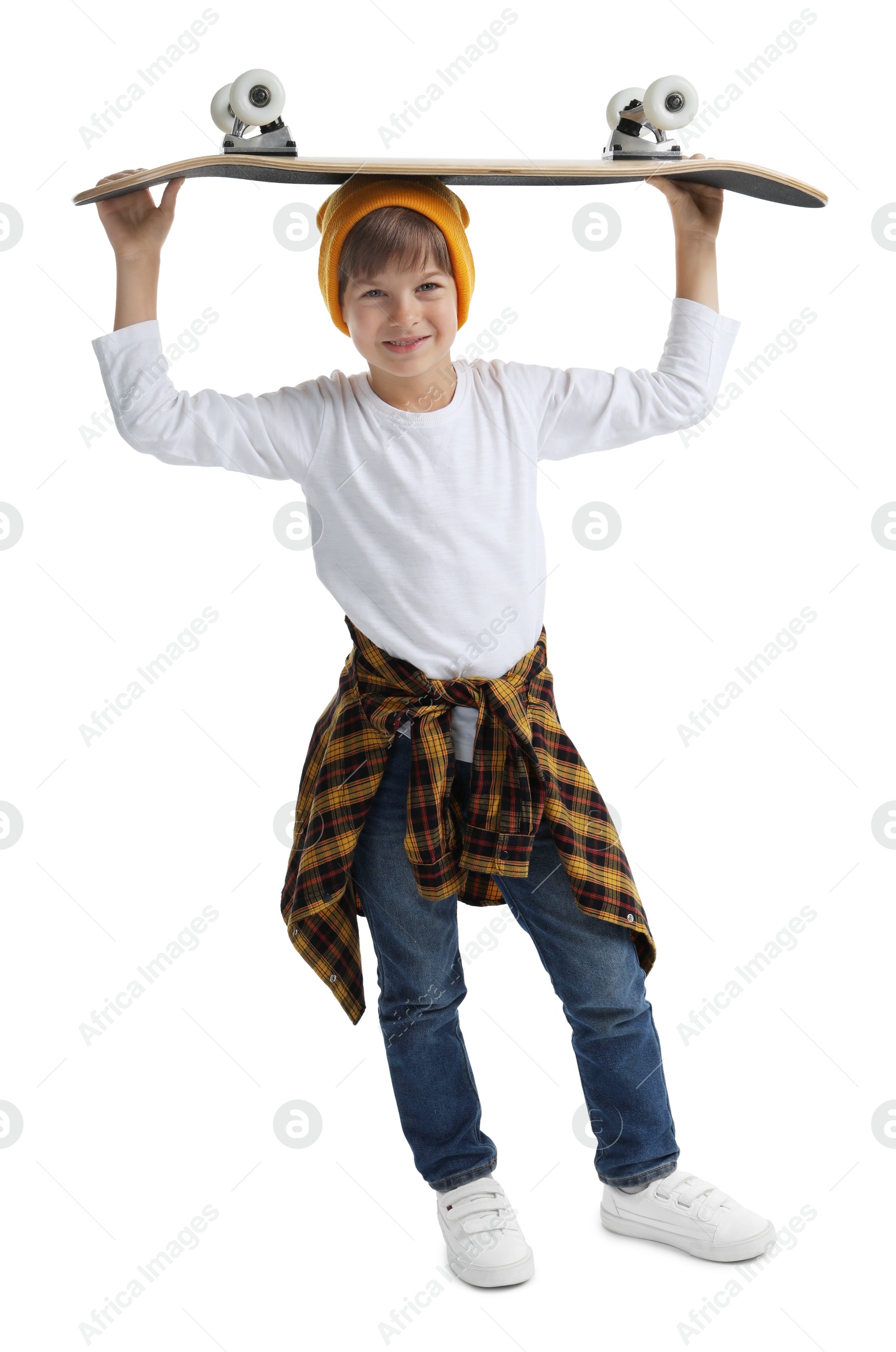 Photo of Little boy with skateboard on white background