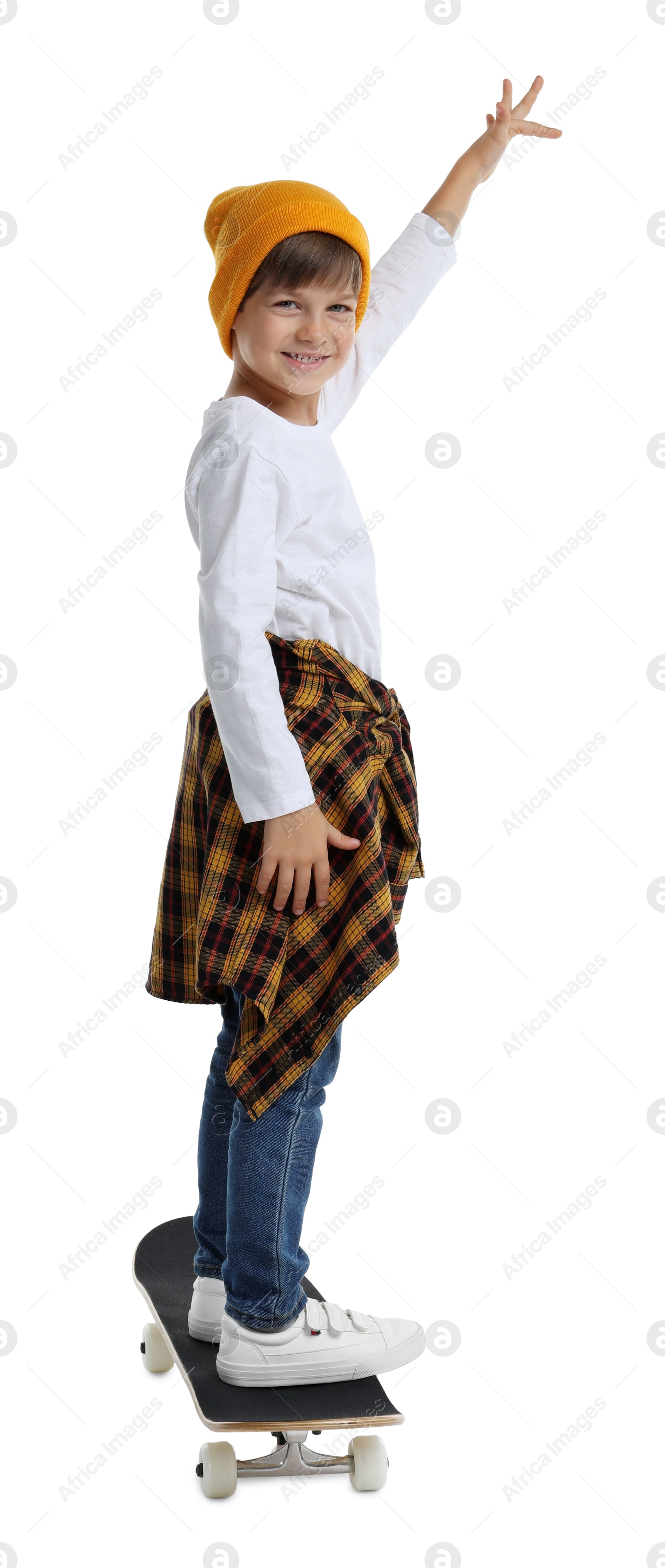 Photo of Little boy with skateboard on white background