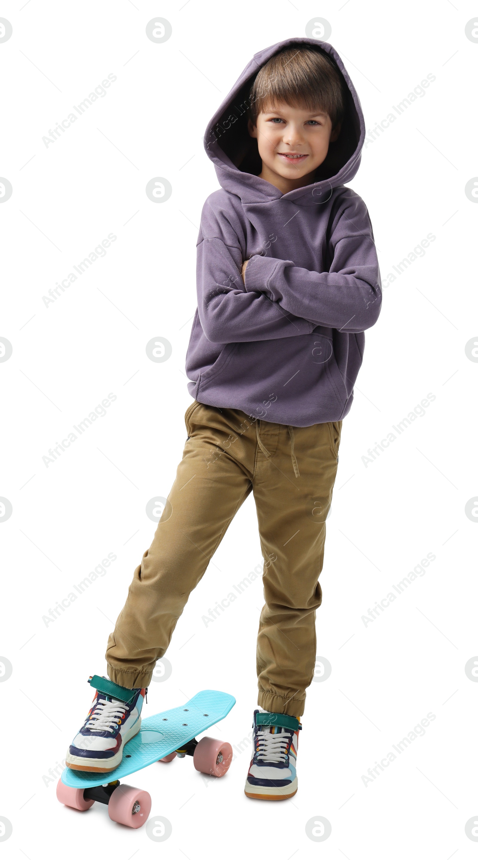 Photo of Little boy with skateboard on white background