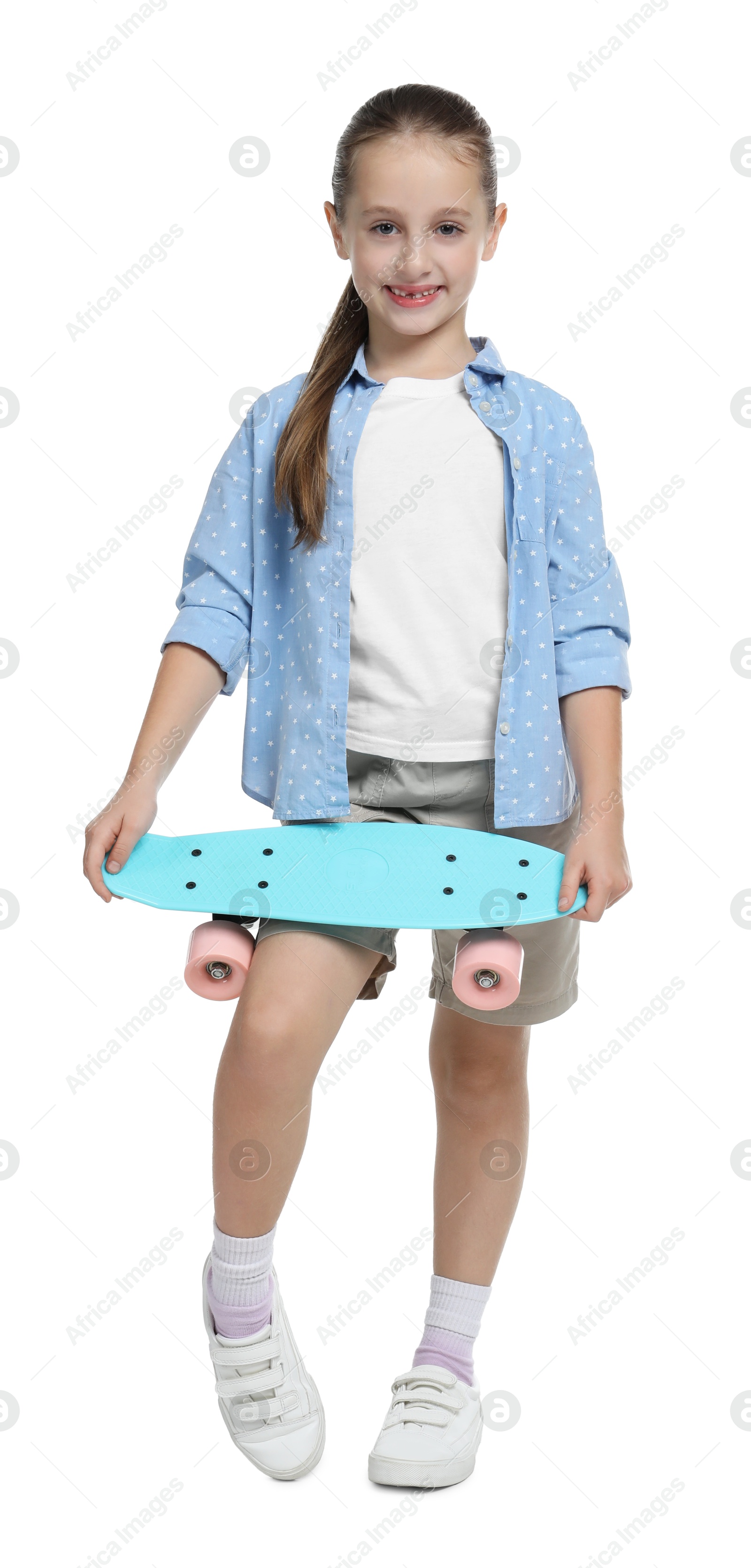 Photo of Little girl with penny board on white background