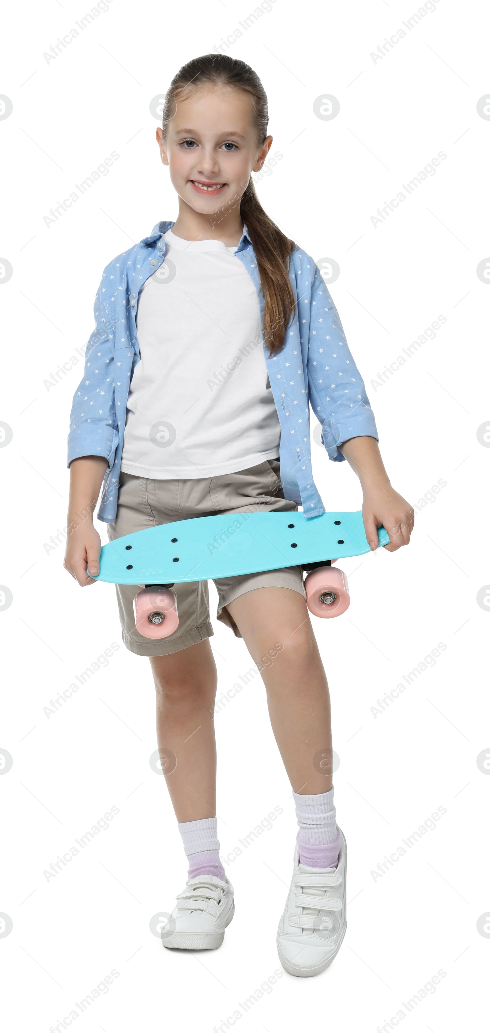 Photo of Little girl with penny board on white background