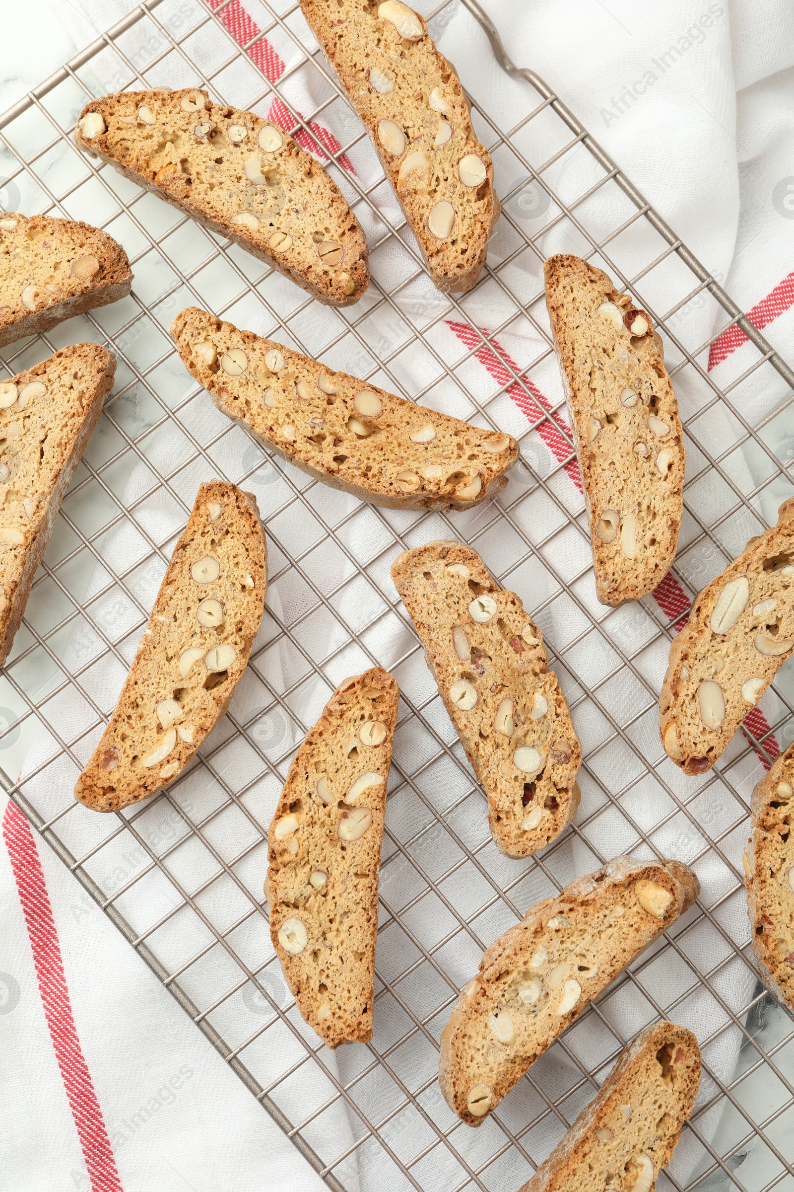 Photo of Traditional Italian almond biscuits (Cantucci) on table, flat lay