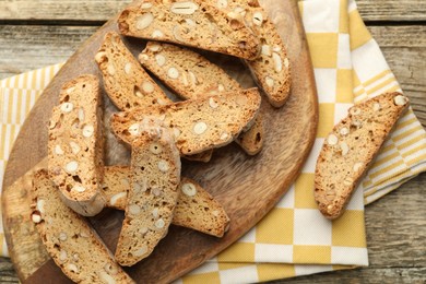 Traditional Italian almond biscuits (Cantucci) on wooden table, flat lay