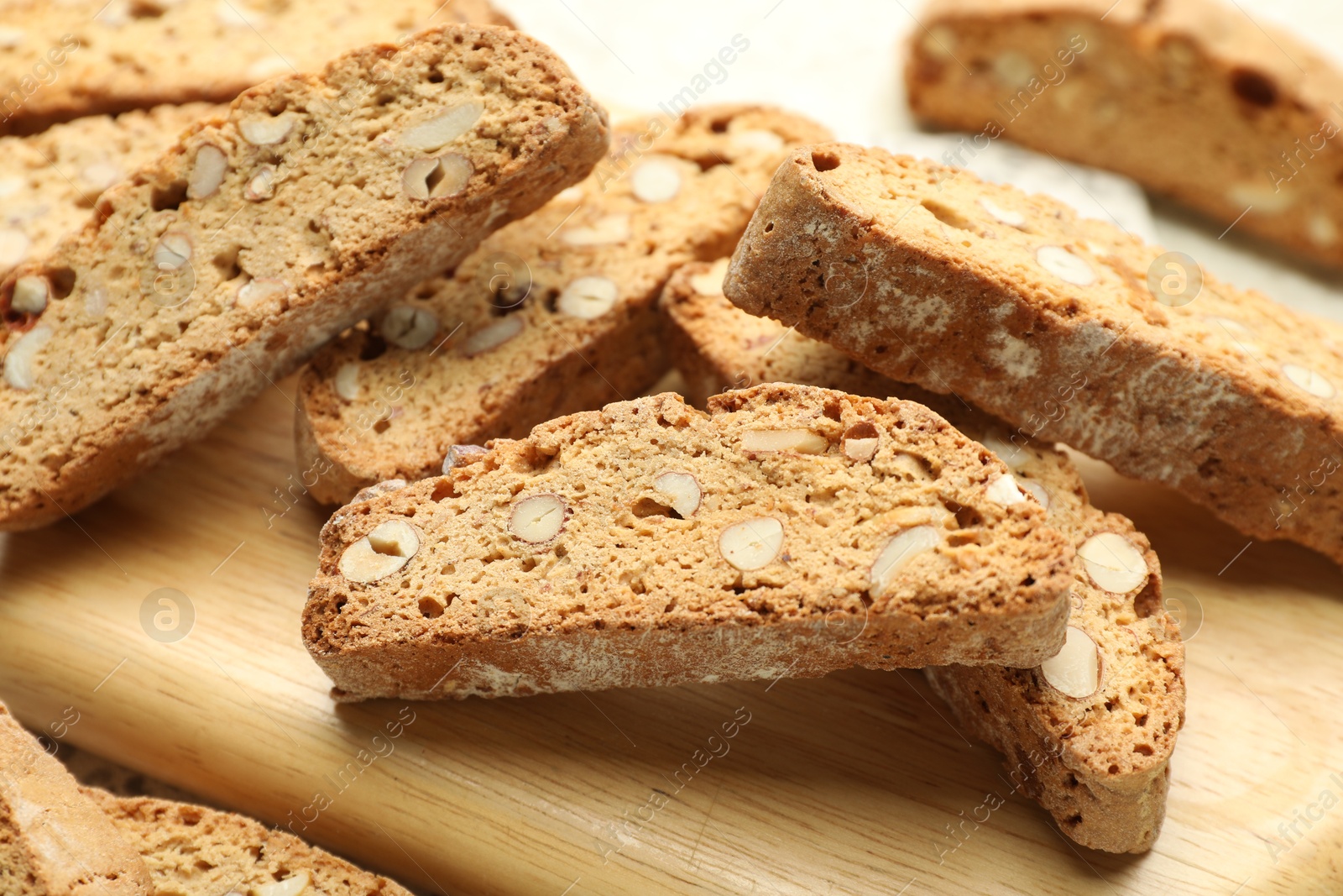 Photo of Traditional Italian almond biscuits (Cantucci) on table, closeup