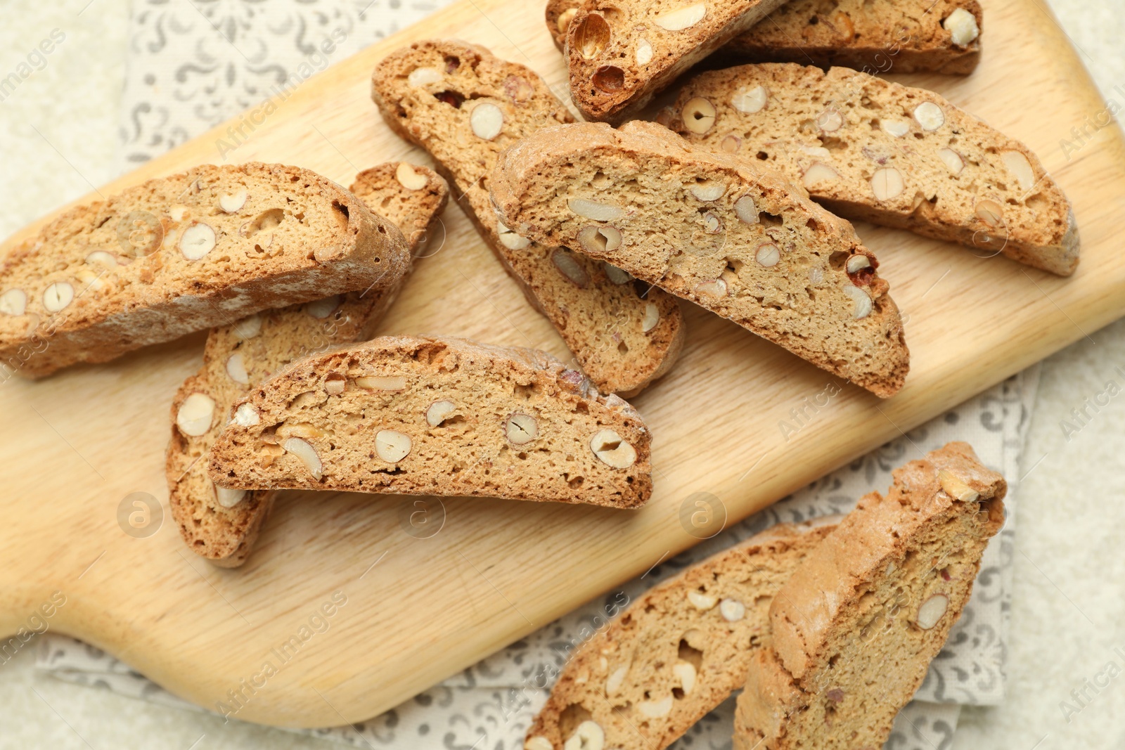 Photo of Traditional Italian almond biscuits (Cantucci) on table, closeup