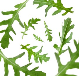 Image of Fresh green arugula in air on white background