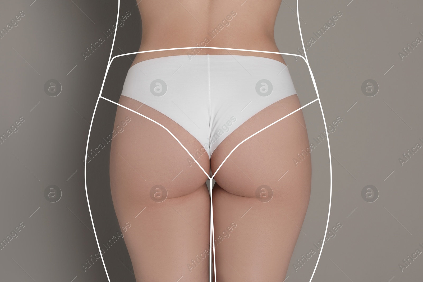 Image of Woman with slim body posing on grey background, closeup. Back view. Line repeating her figure