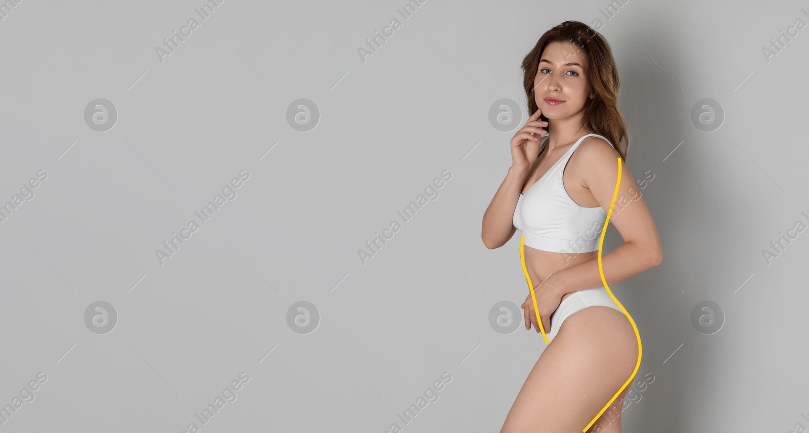 Image of Beautiful young woman in underwear posing on grey background. Lines repeating her slim body. Banner design with space for text