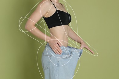 Woman in big jeans showing her slim body on olive color background, closeup. Lines repeating her figure