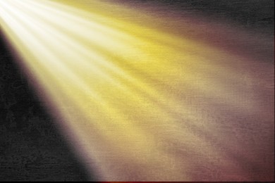 Image of Ray of bright divine light in darkness