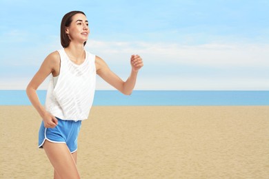 Beautiful woman running on beach. Space for text