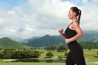 Sporty woman running on meadow near lake. Space for text