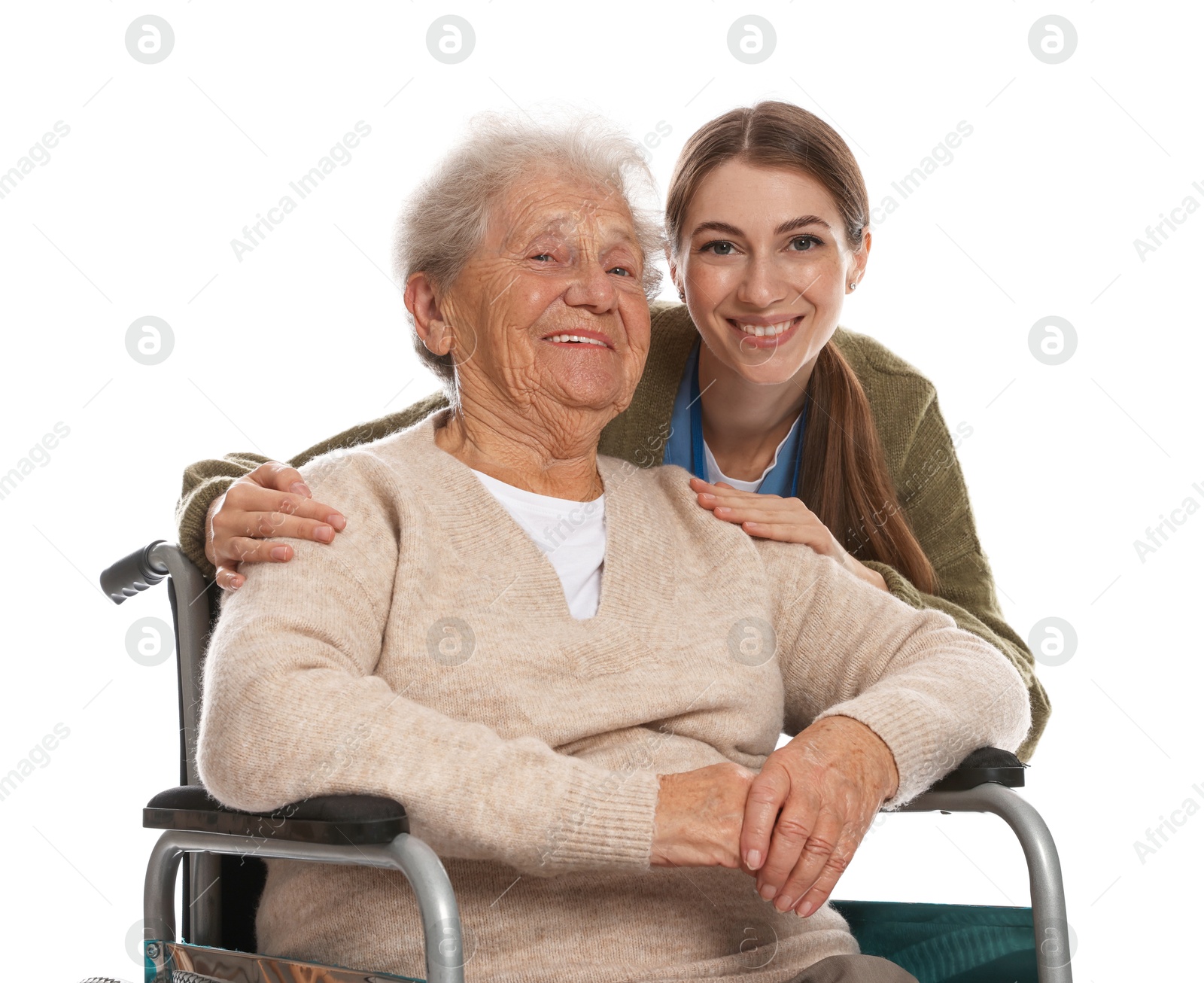 Photo of Caregiver assisting senior woman in wheelchair on white background. Home health care service