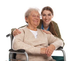 Caregiver assisting senior woman in wheelchair on white background. Home health care service