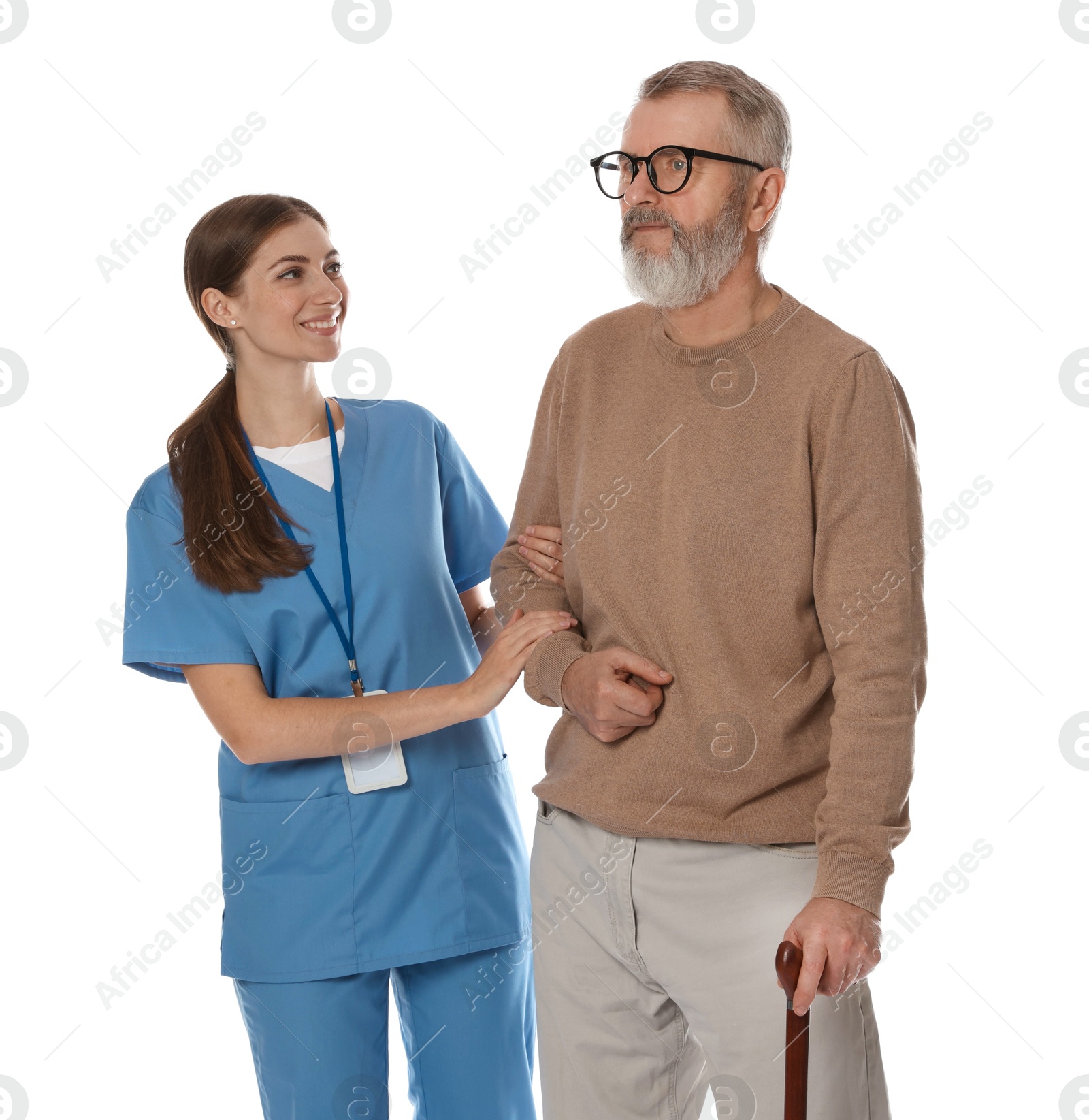 Photo of Caregiver supporting senior man with walking cane on white background. Home health care service