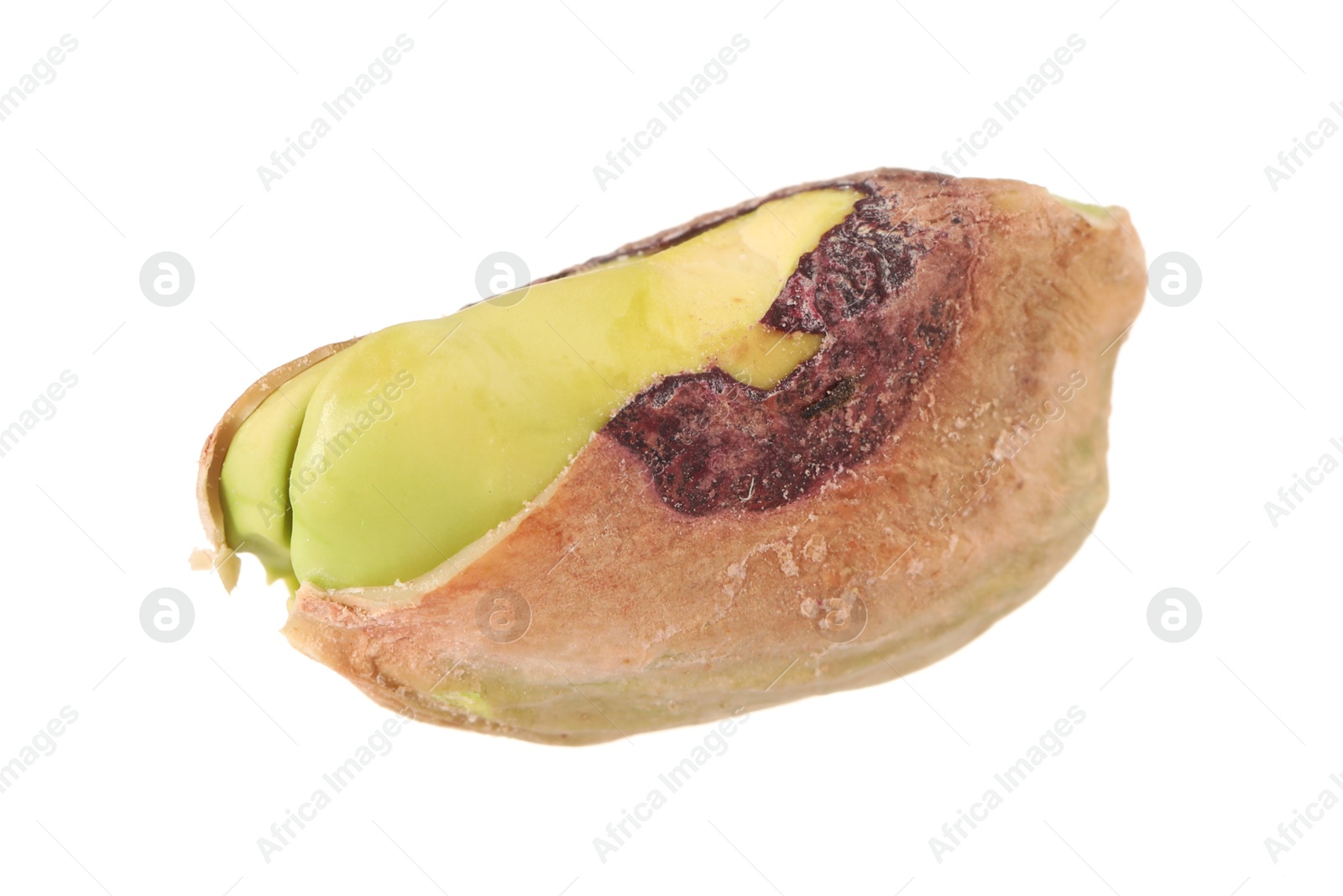 Photo of One peeled pistachio nut isolated on white