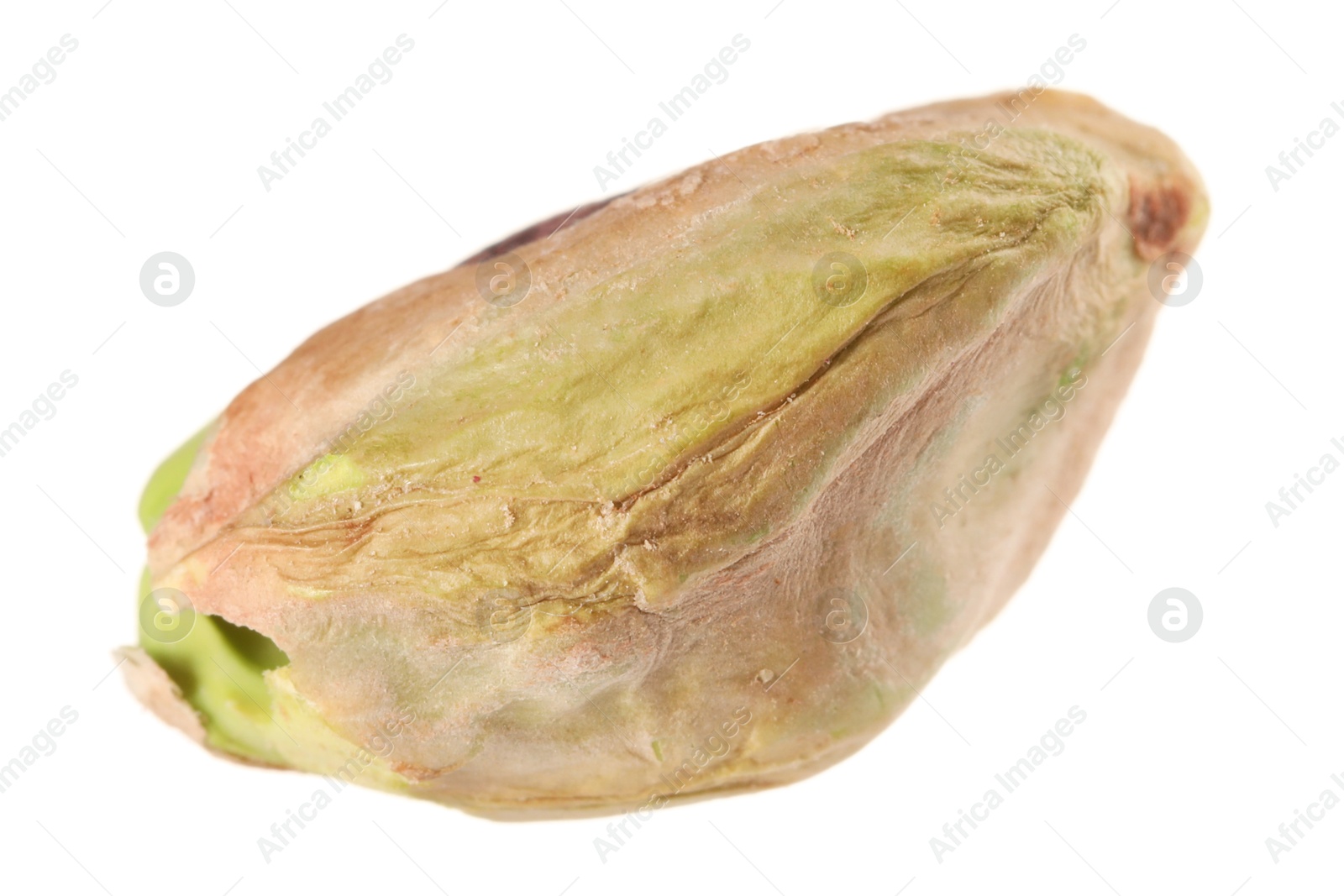 Photo of One peeled pistachio nut isolated on white