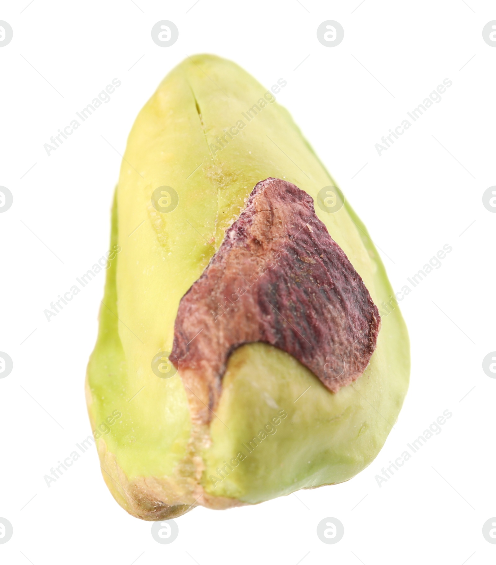 Photo of One peeled pistachio nut isolated on white