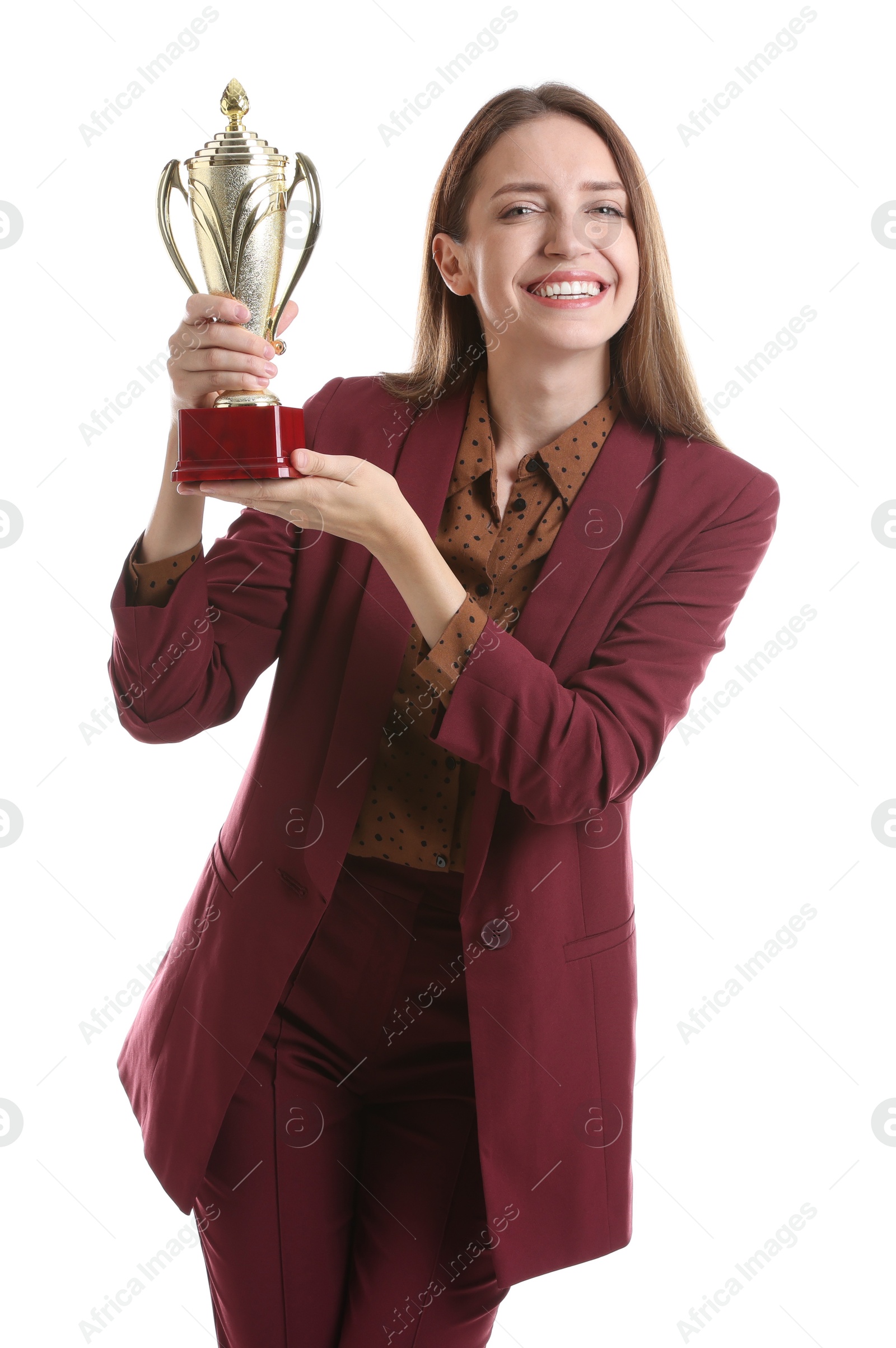 Photo of Happy winner with gold trophy cup on white background