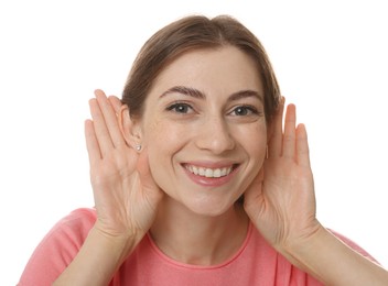 Woman showing hand to ear gesture on white background