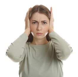 Woman covering her ears on white background