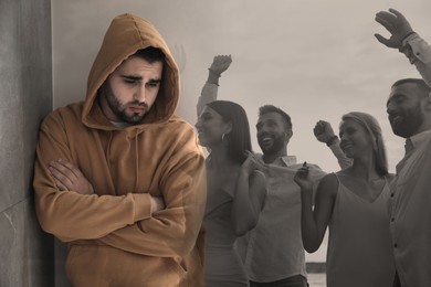 Image of Loneliness. Sad man in room and group of friends having fun outdoors, double exposure