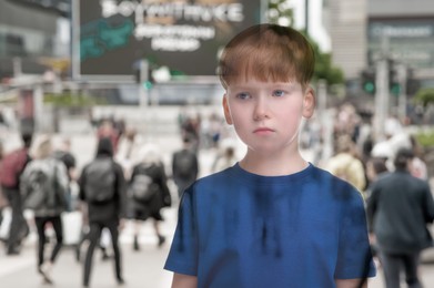 Loneliness. Sad boy and crowded street, double exposure