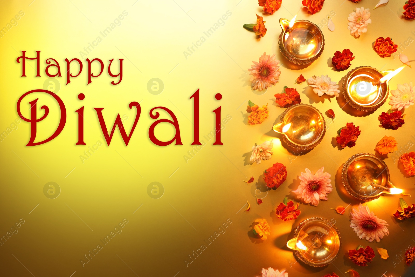 Image of Happy Diwali greeting card, Hindu festival of lights. Diya lamps and beautiful flowers on golden background, flat lay