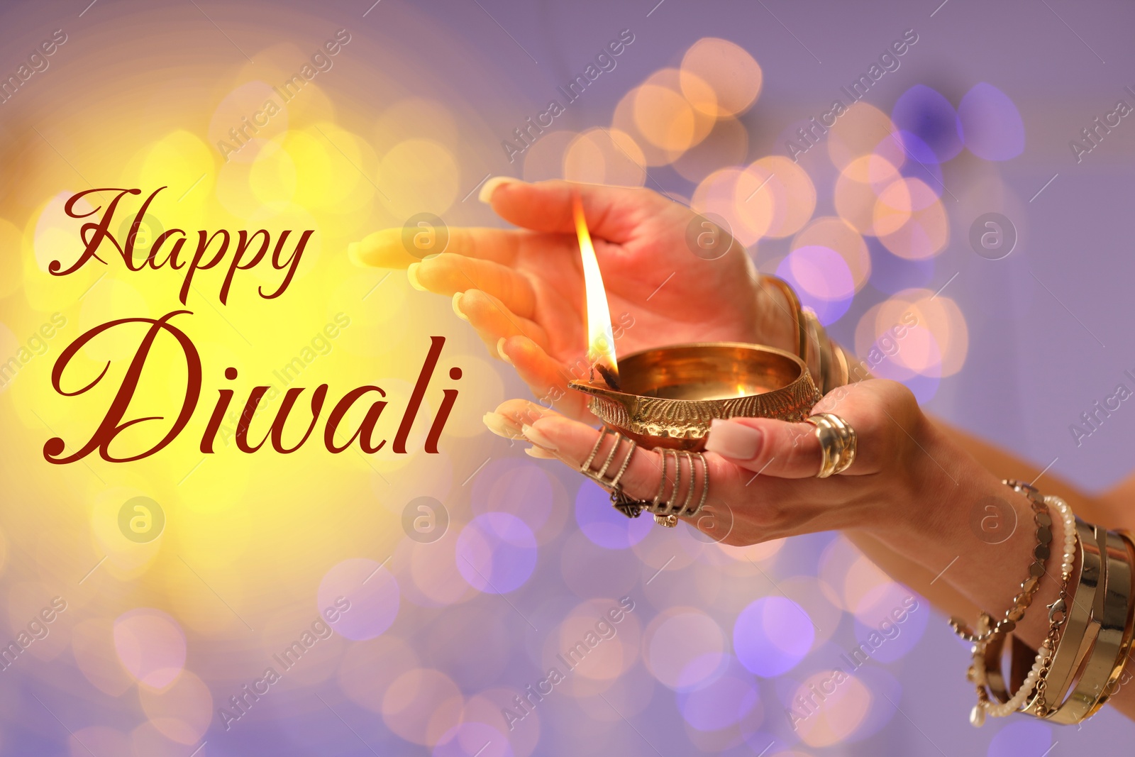 Image of Happy Diwali greeting card, Hindu festival of lights. Woman holding lit diya lamp on color background with blurred lights, closeup