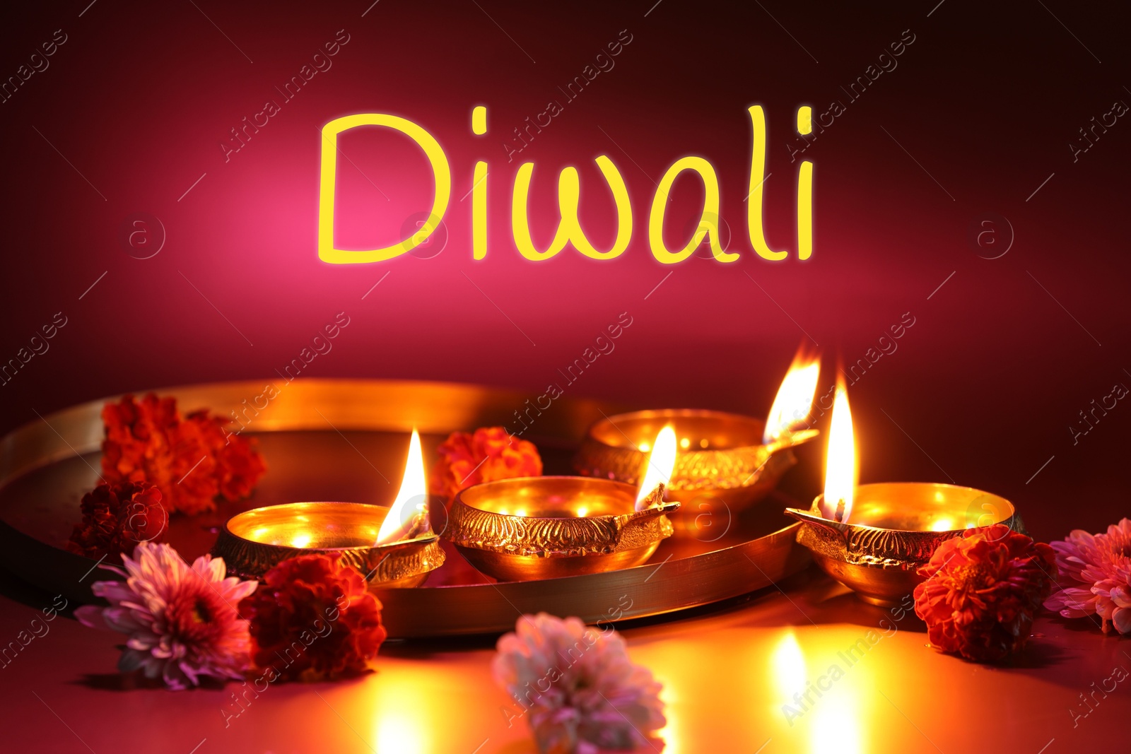 Image of Happy Diwali greeting card, Hindu festival of lights. Diya lamps and beautiful flowers on color background