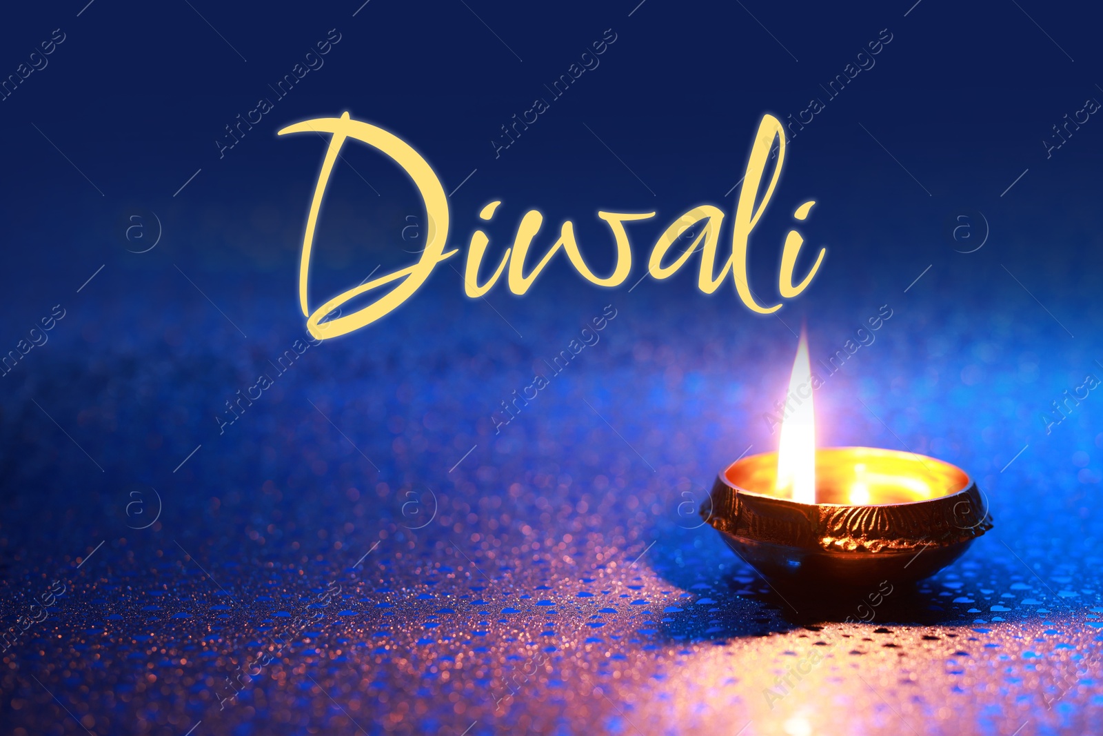 Image of Happy Diwali greeting card, Hindu festival of lights. Diya lamp on blue background