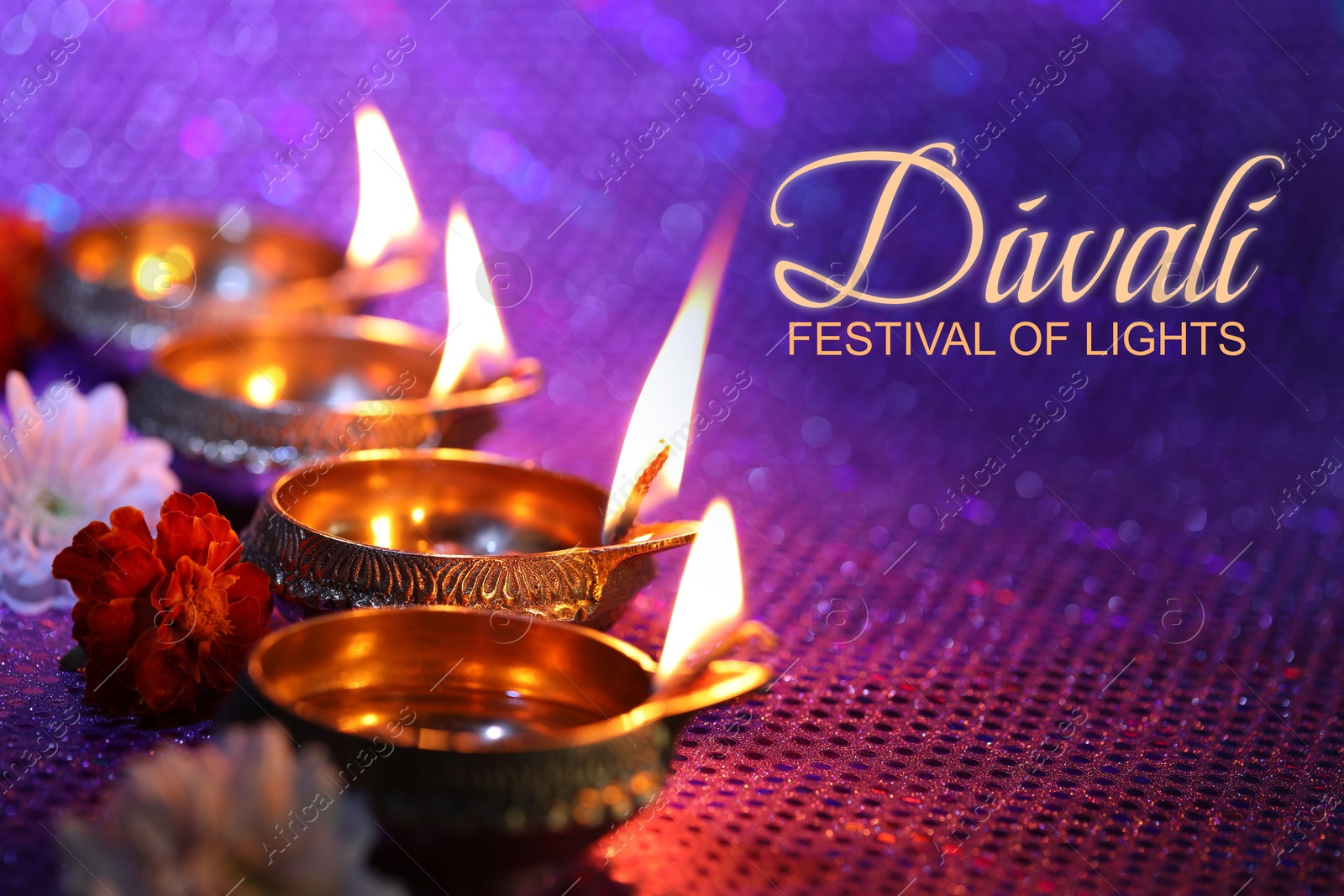 Image of Happy Diwali greeting card, Hindu festival of lights. Diya lamps and beautiful flowers on color background, closeup